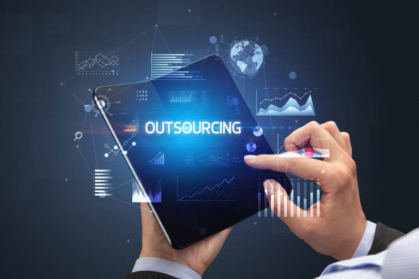 Why do companies resort to outsourcing?