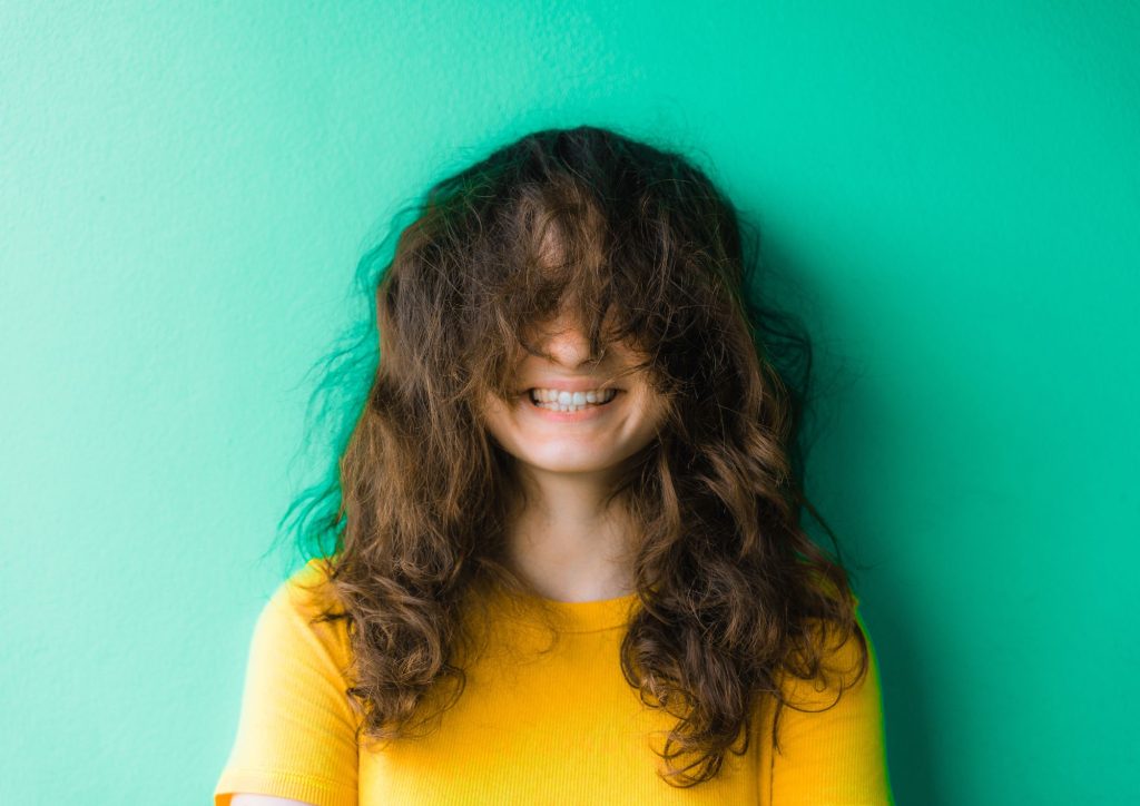 The Pros and Cons of Using ACV On Your Hair